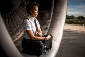 Female Pilot sitting in an Airline Engine